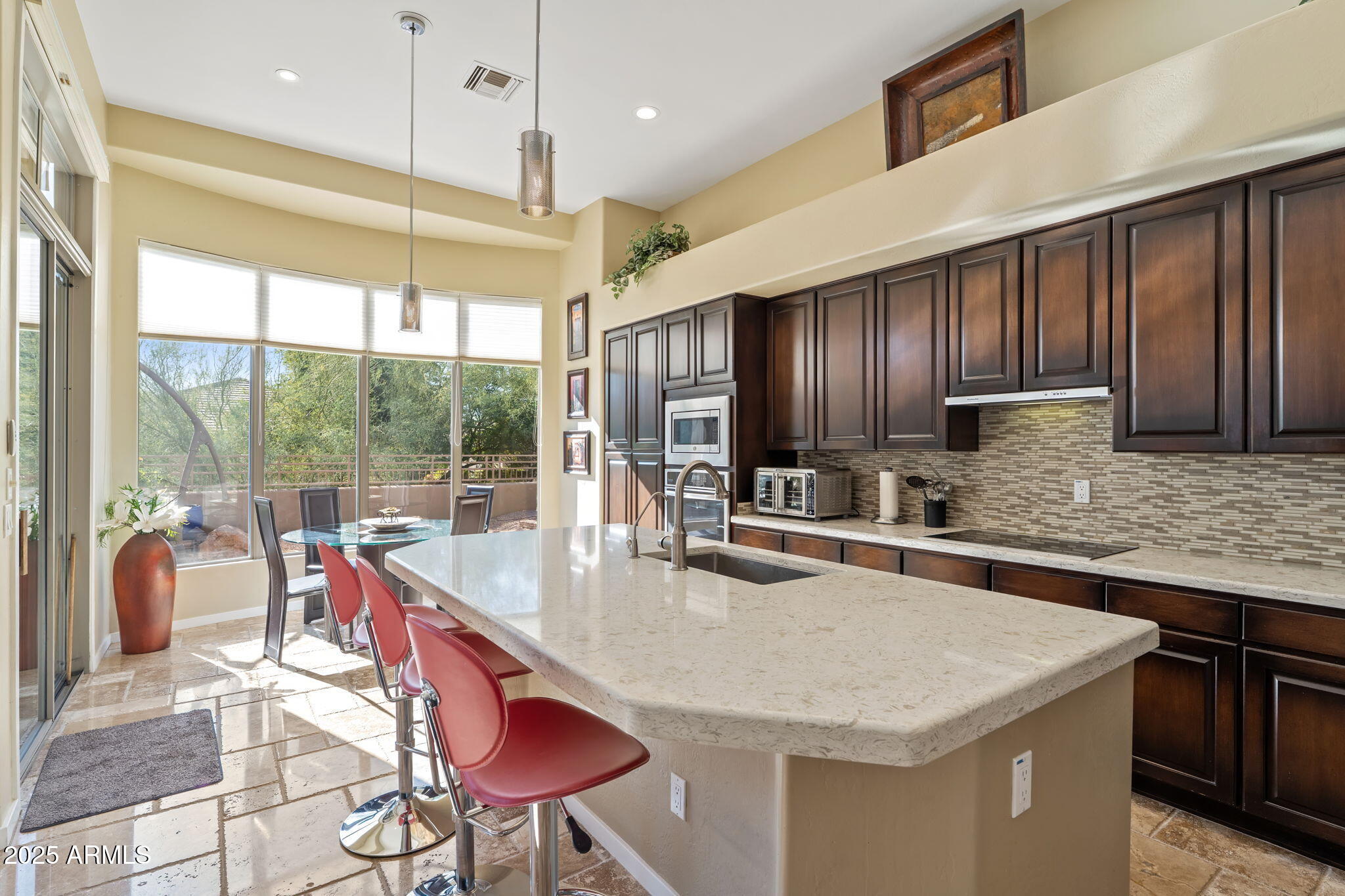 7699 E FLEDGLING Drive