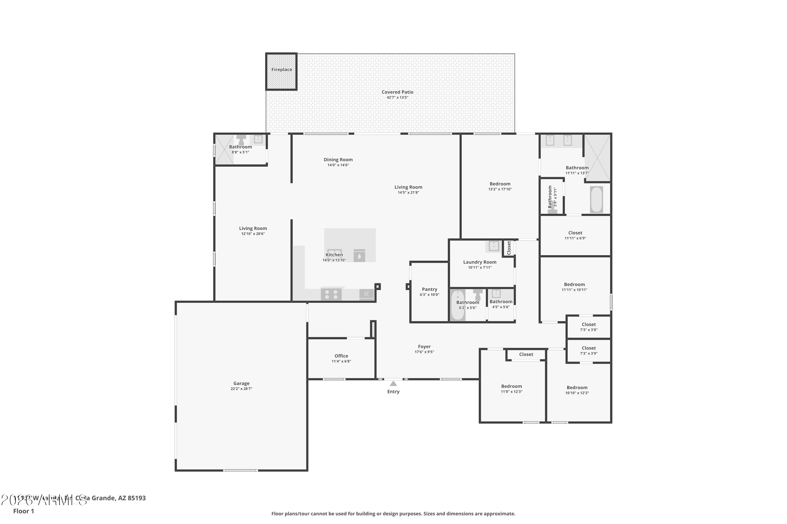 Home floor plan with multiple bedrooms, a large garage, and a covered patio with fireplace.