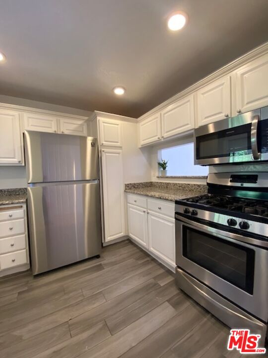 8651 W Olympic Blvd Unit: 303