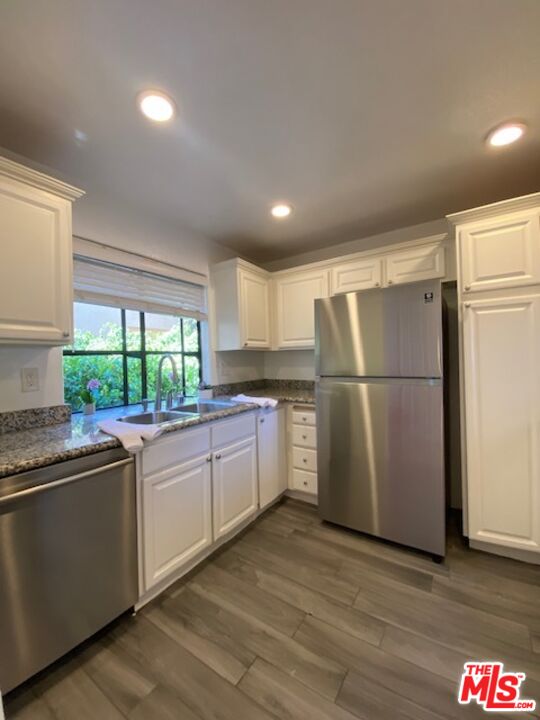 8651 W Olympic Blvd Unit: 303