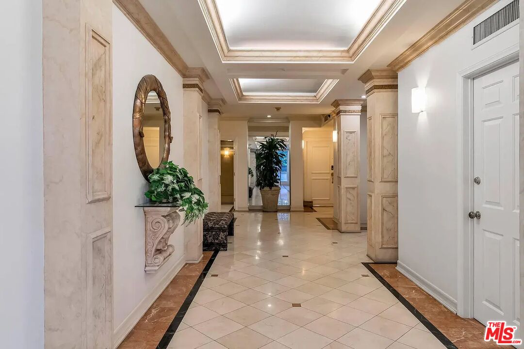 121 N Almont Dr Unit: 203