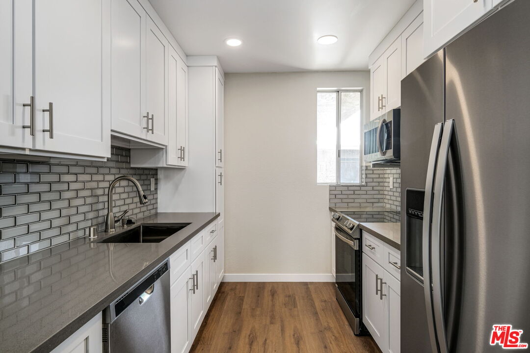 1342 HARVARD ST Unit: 201