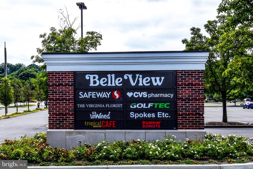 Belle View shopping-center sign listing its shops, including Safeway, CVS pharmacy, and Dunkin' Donuts.