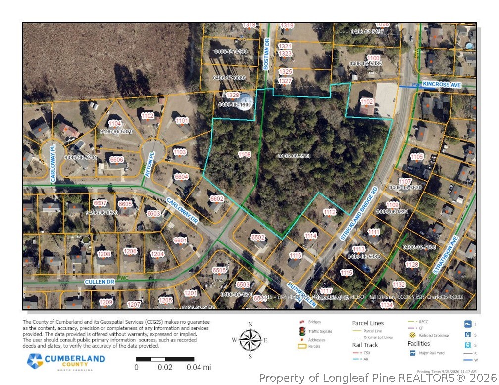 Parcel map showing a wooded tract outlined among neighboring lots and labeled roads.
