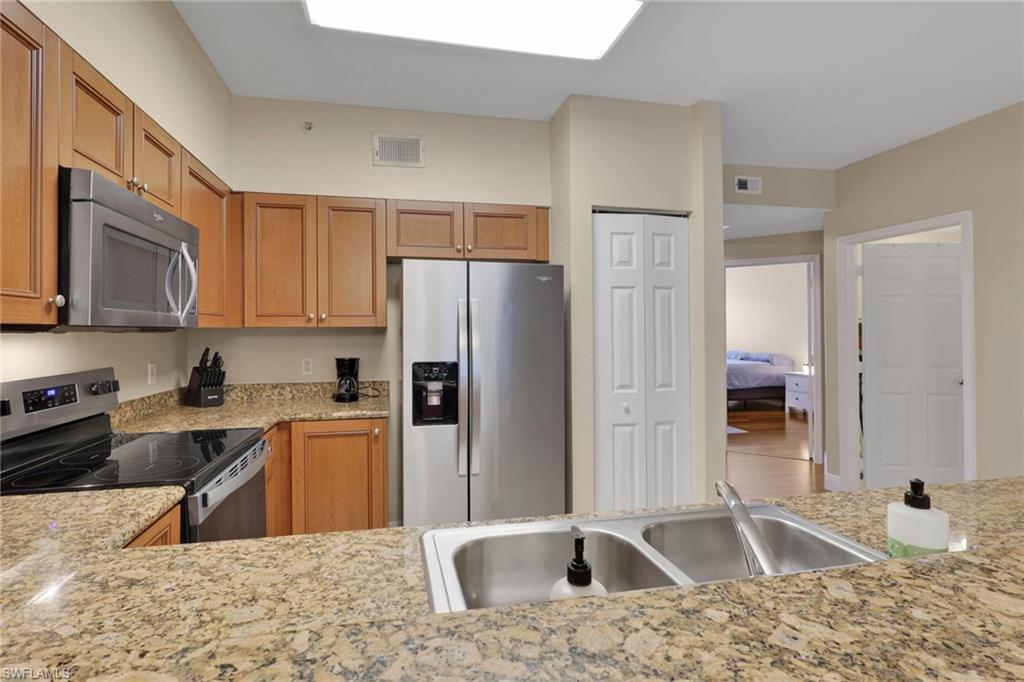 10100 Villagio Palms WAY # 203