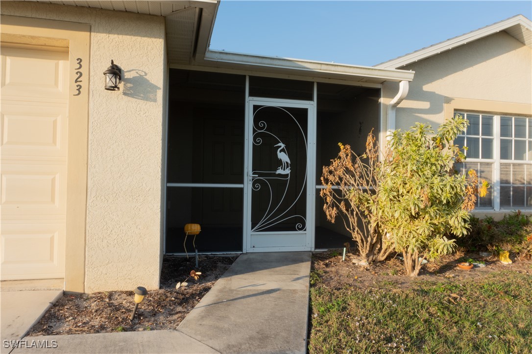323 NW 10th ST