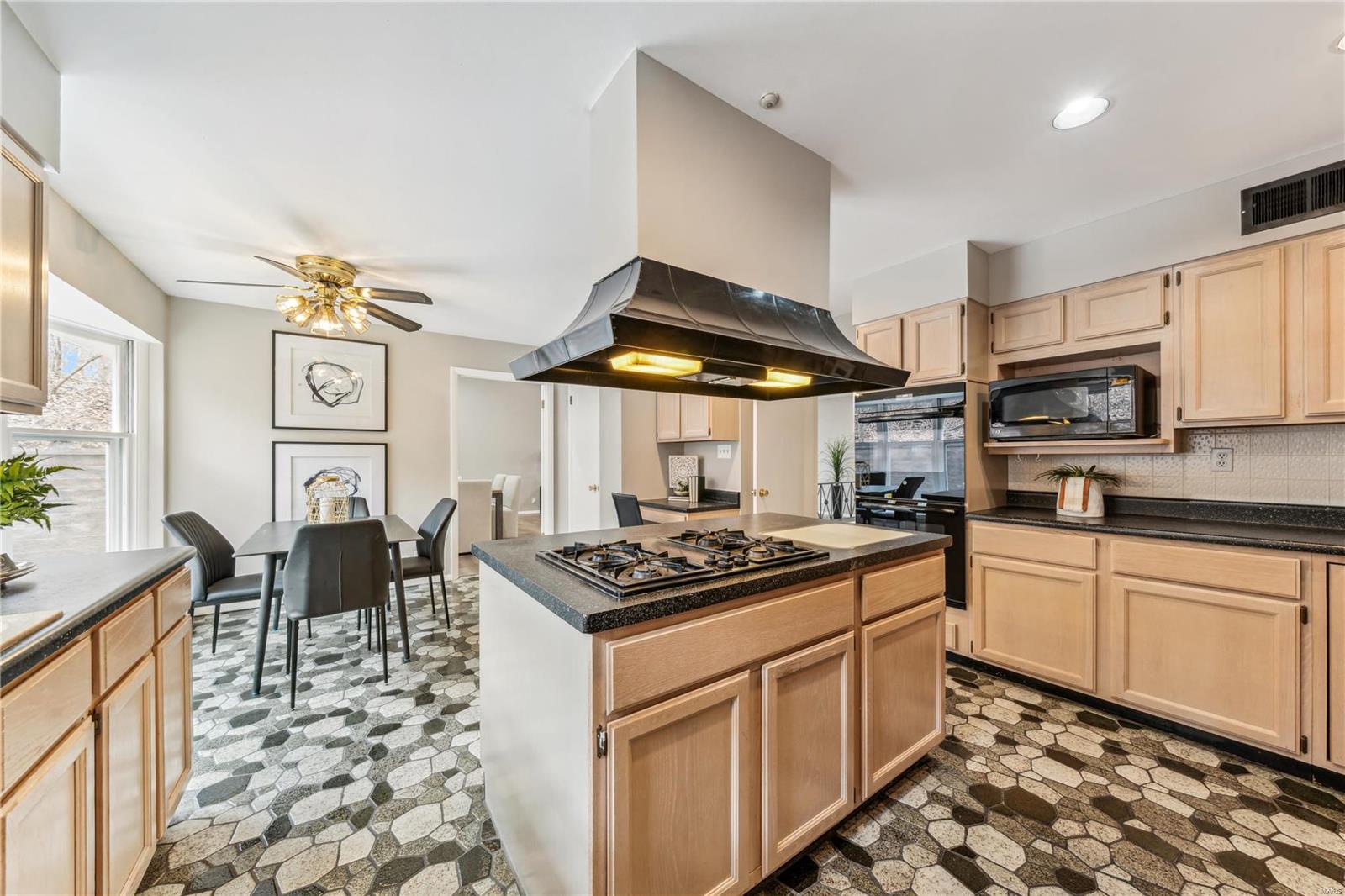 9474 Bonhomme Woods Drive