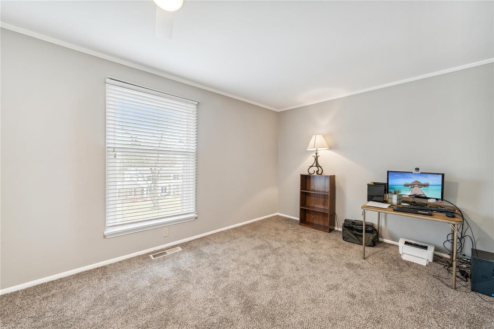 9474 Bonhomme Woods Drive