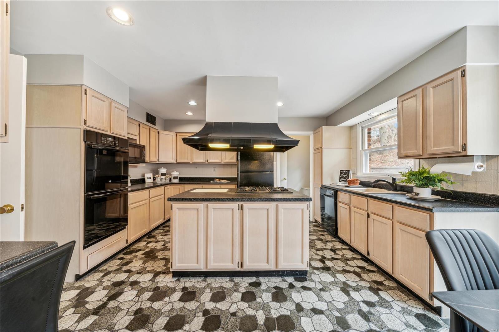 9474 Bonhomme Woods Drive