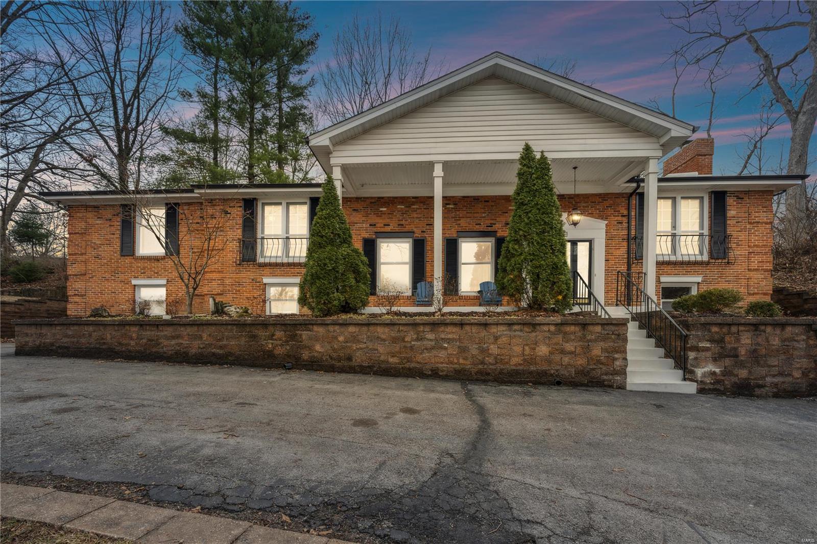 9474 Bonhomme Woods Drive