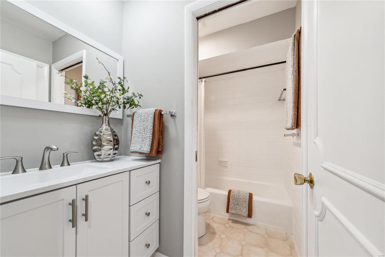 9474 Bonhomme Woods Drive