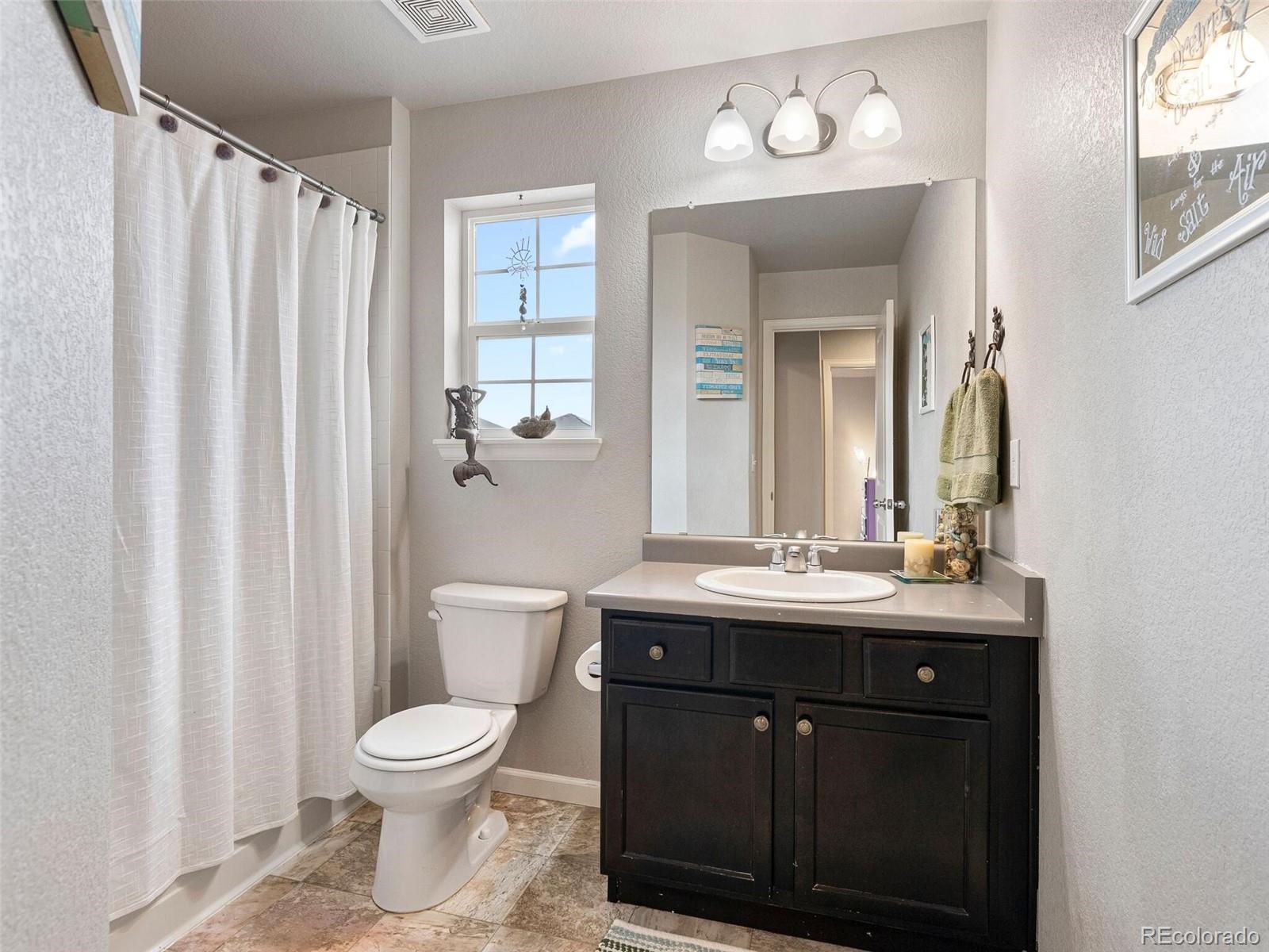 6123 N Genoa Way