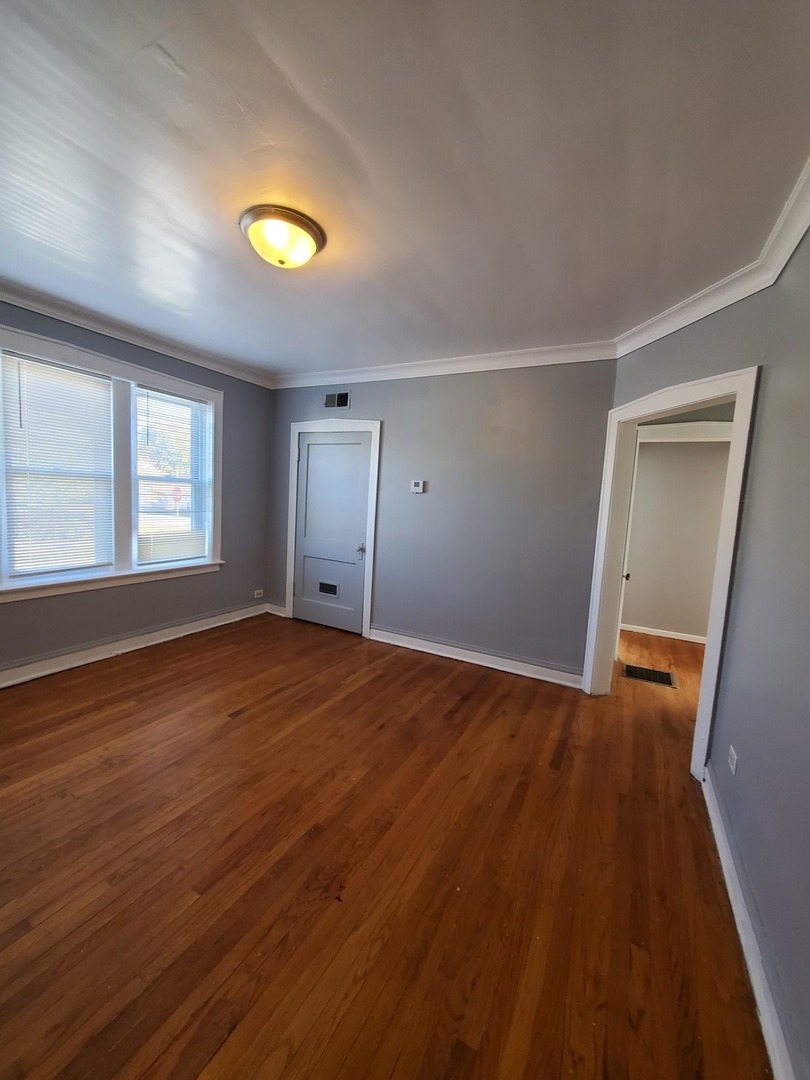 8758 S May Street Unit: 1S