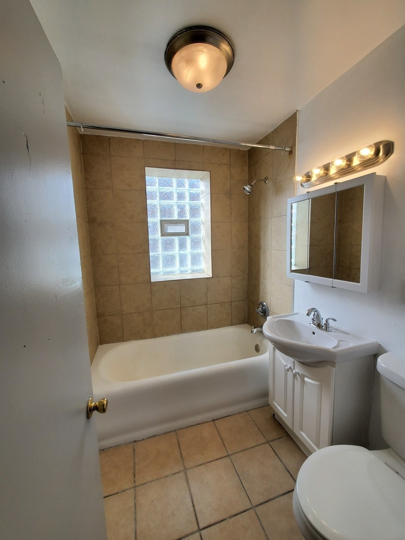 8758 S May Street Unit: 1S