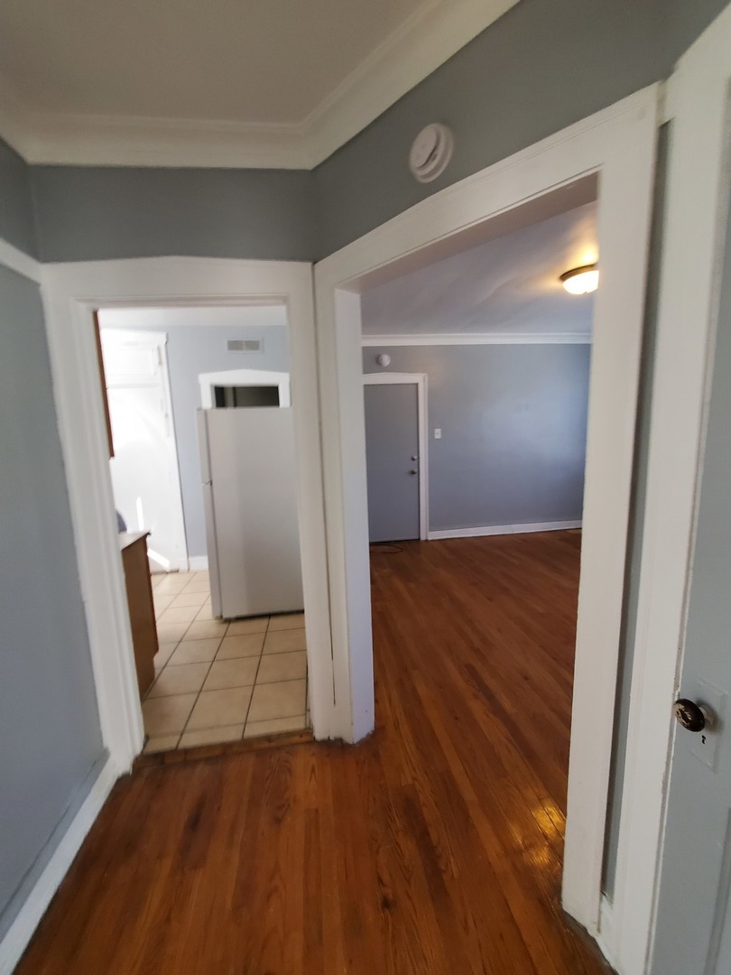 8758 S May Street Unit: 1S