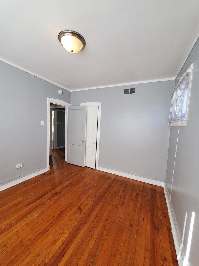 8758 S May Street Unit: 1S