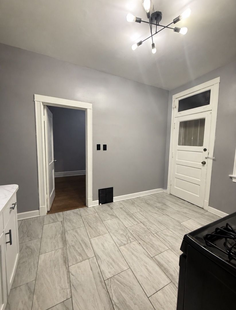 7031 S Laflin Street Unit: 1