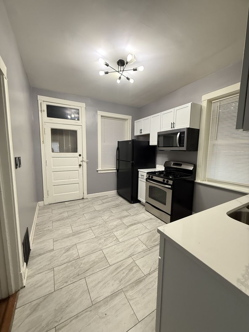 7031 S Laflin Street Unit: 1