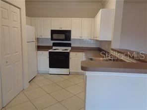 4302 BAYSIDE VILLAGE DR #303