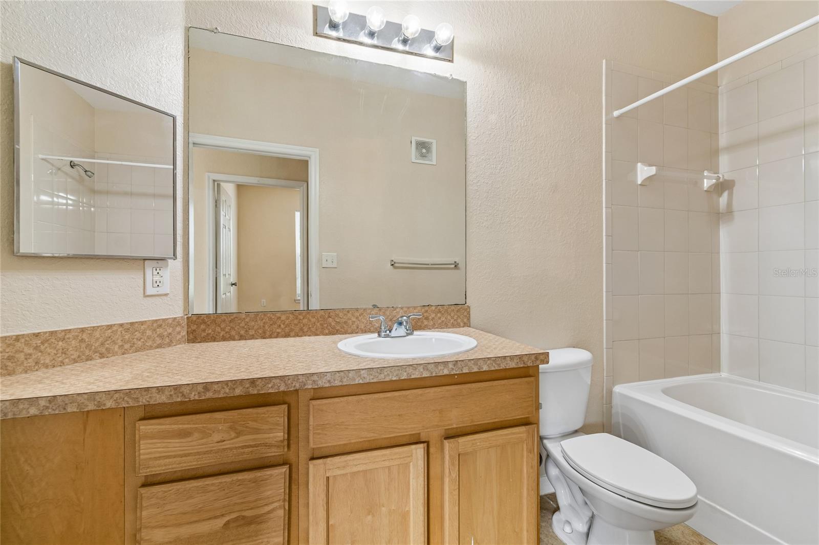 10203 COURTNEY PALMS BLVD #103