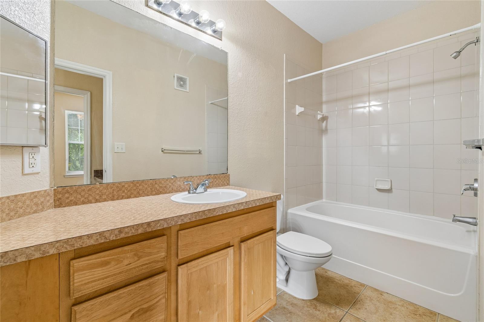 10203 COURTNEY PALMS BLVD #103