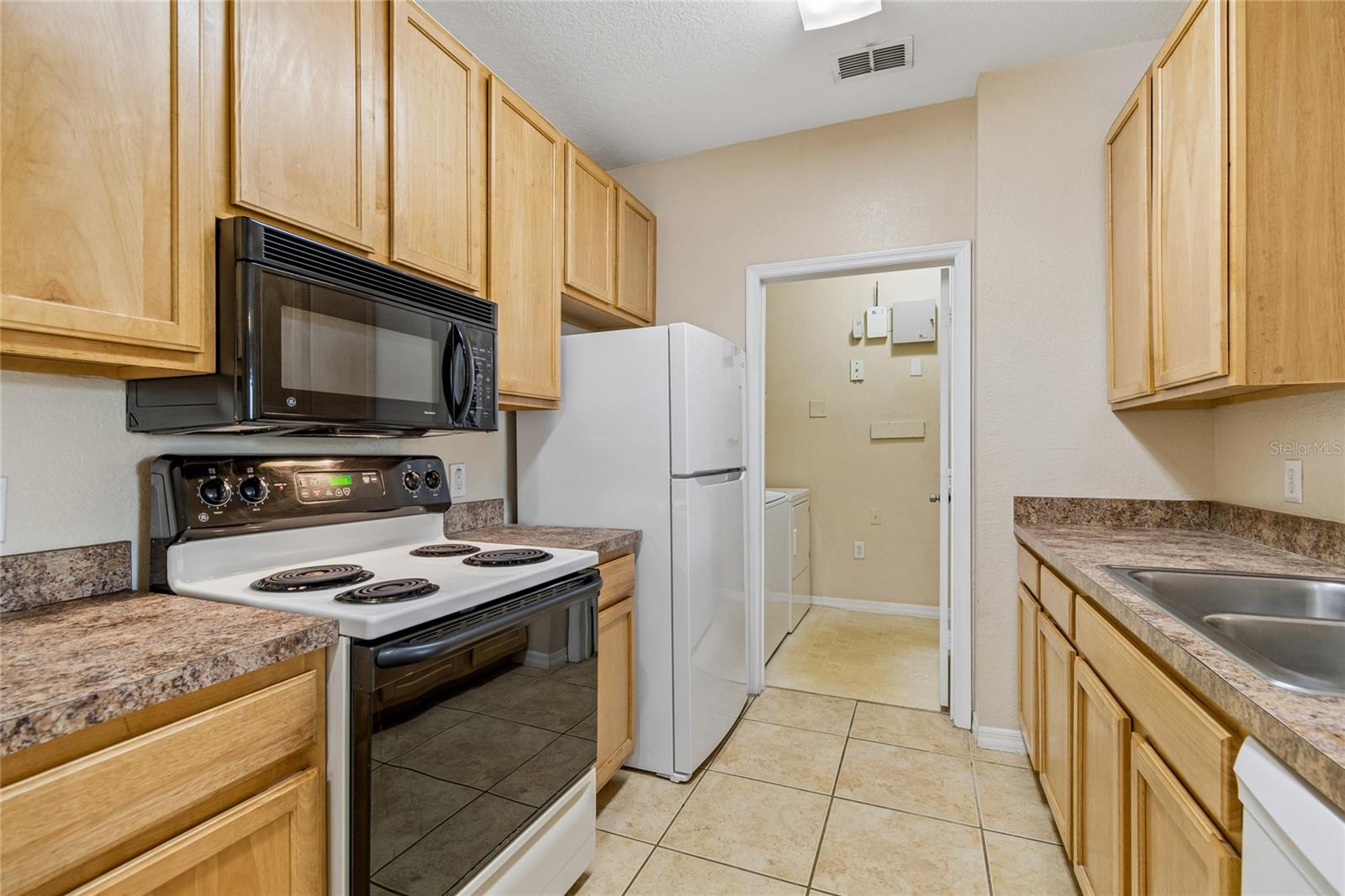 10203 COURTNEY PALMS BLVD #103