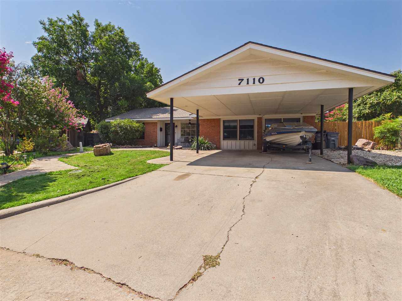 7110 NW Woodland Circle