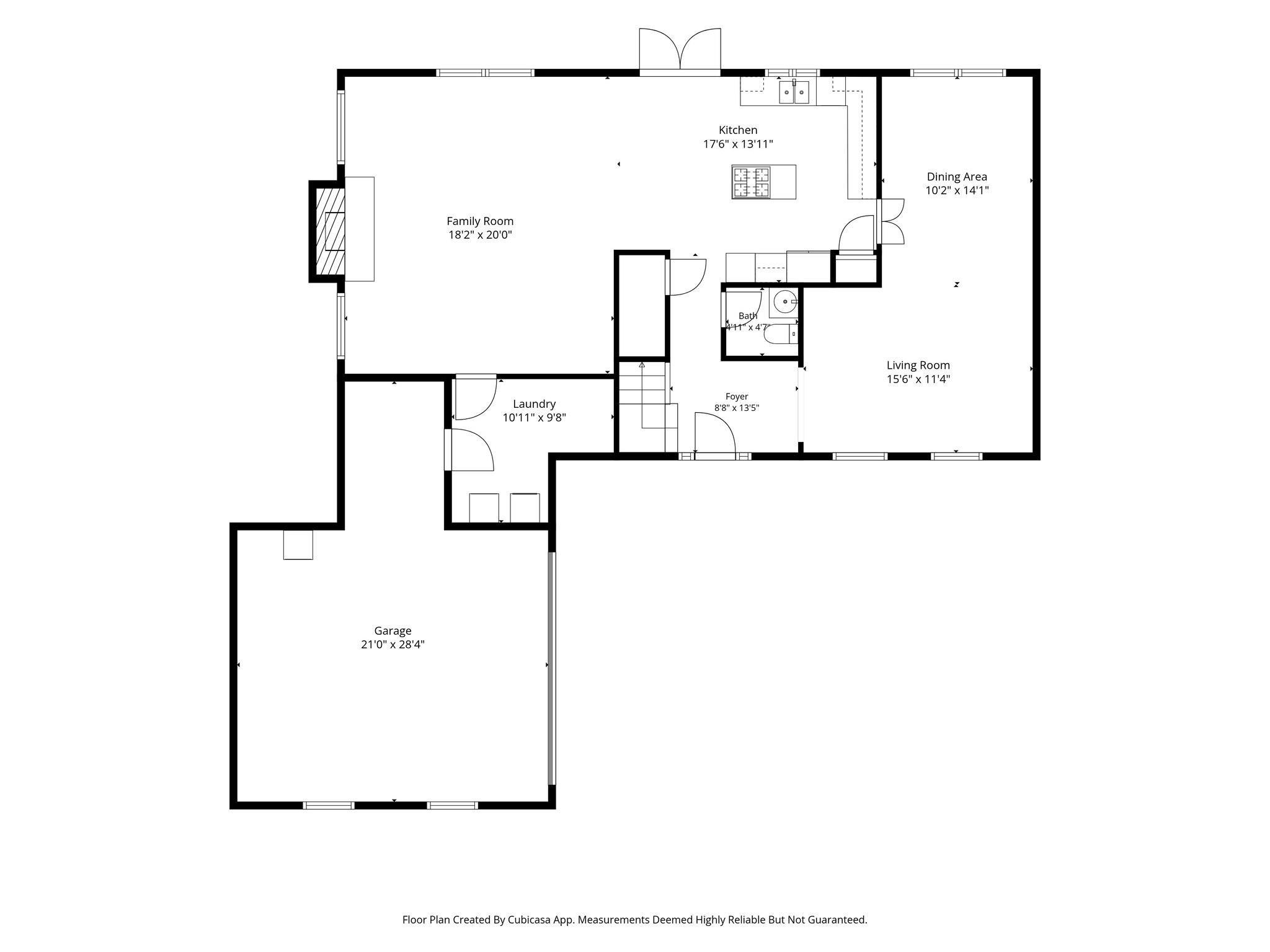 Floor plan showing the family room, kitchen, living and dining areas, laundry, bath, foyer, and garage.