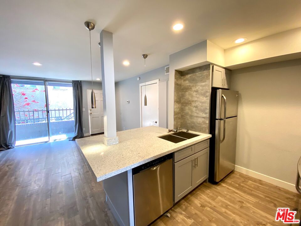 1529 S Bundy Dr Unit: 103