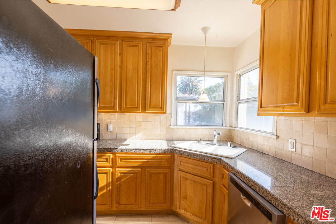 8537 Cashio St Unit: 1/2