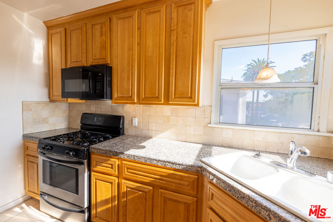 8537 Cashio St Unit: 1/2