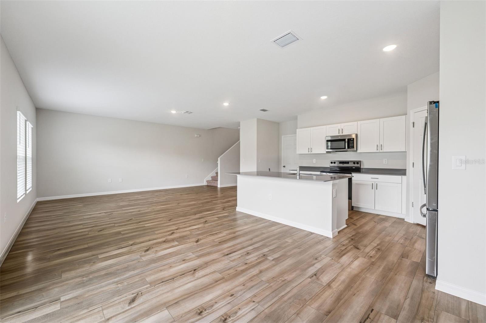 7727 PEACE LILY AVE