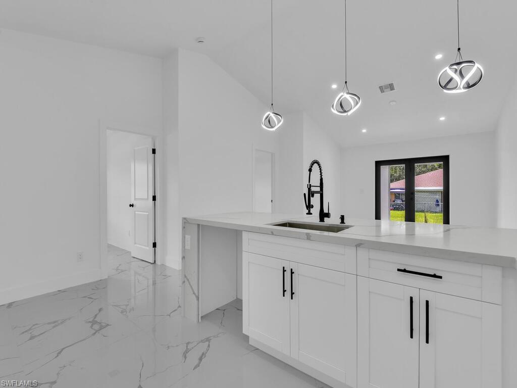 4917/4919 Leonard BLVD S