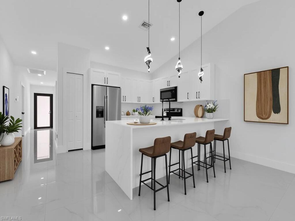 4956/4958 LEONARD BLVD S