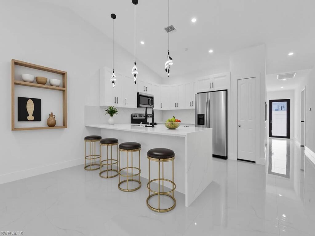 4956/4958 LEONARD BLVD S