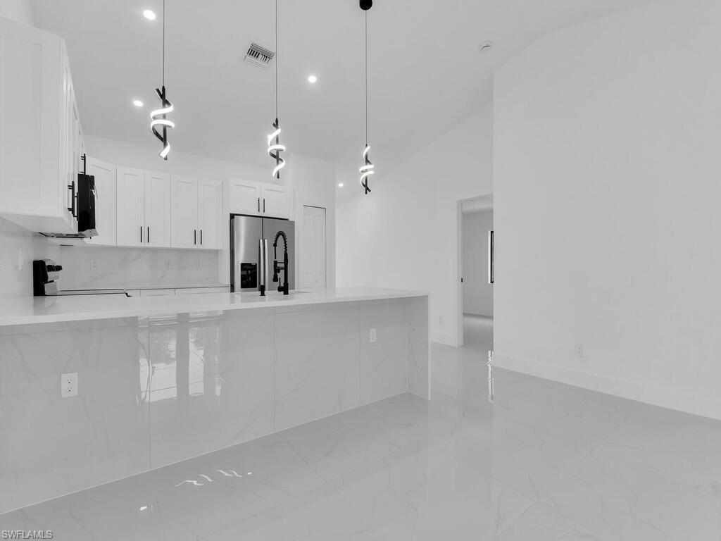 4956/4958 LEONARD BLVD S