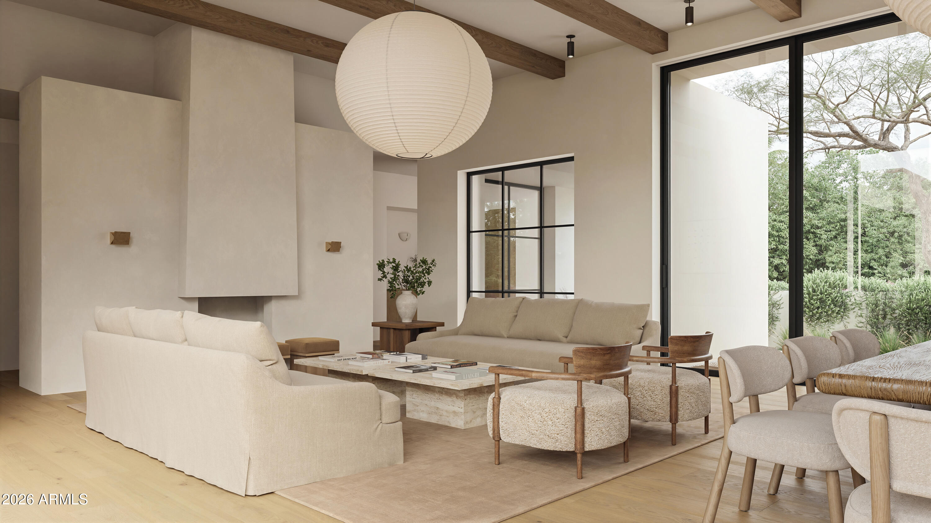 Modern living room with pale sofas, a stone coffee table, and floor-to-ceiling glass doors.