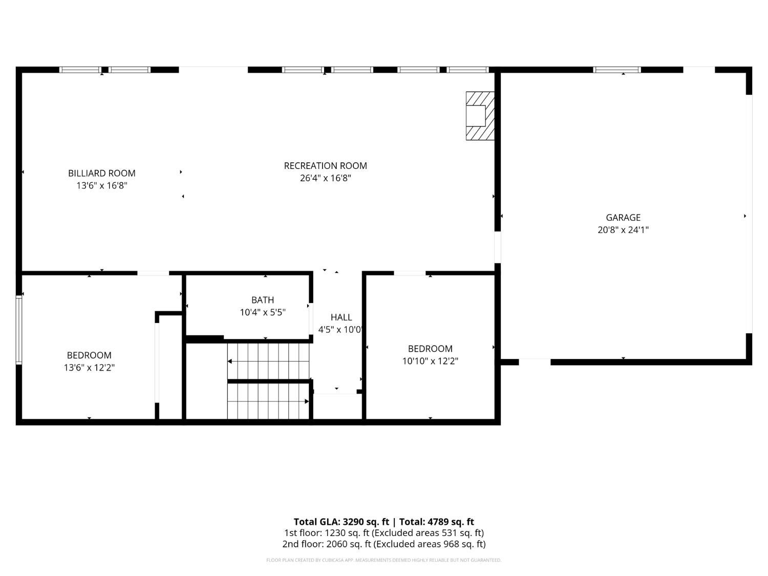 Floor plan showing two bedrooms, a bath, billiard and recreation rooms, and a large garage.