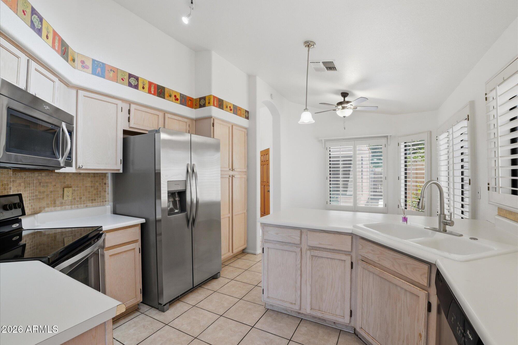246 E VAUGHN Avenue
