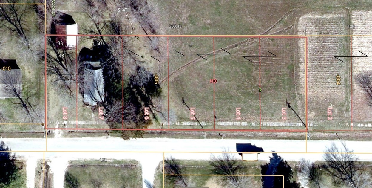 Aerial parcel map with outlined and labeled lots along a road.