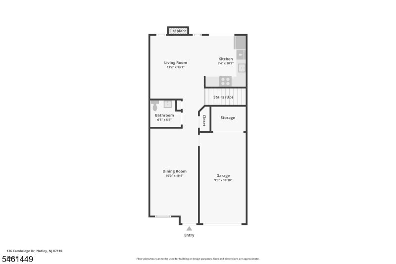 First-floor plan showing living and dining rooms, kitchen, bathroom, garage, and entry.