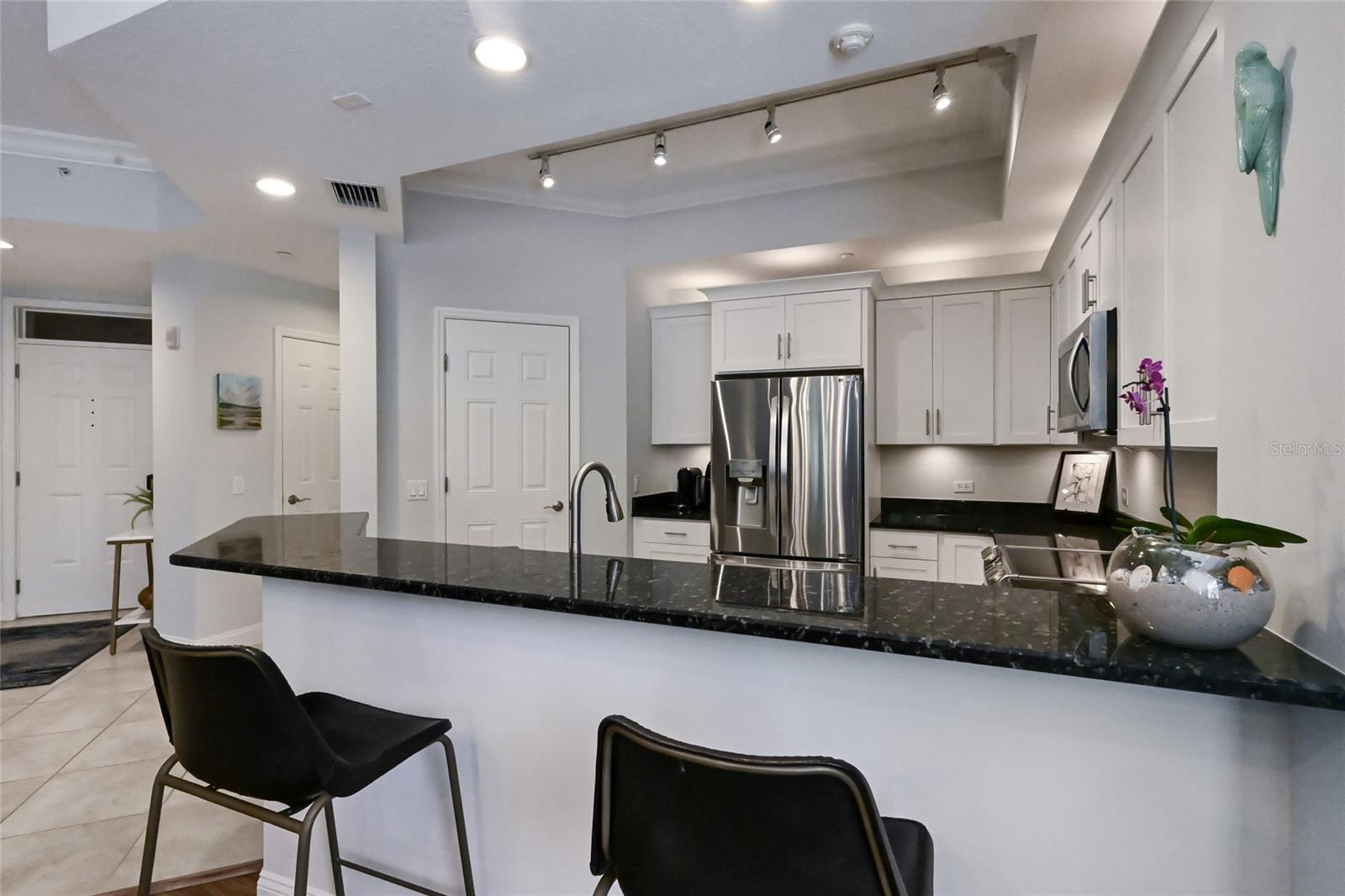 7718 LAKE VISTA CT #201