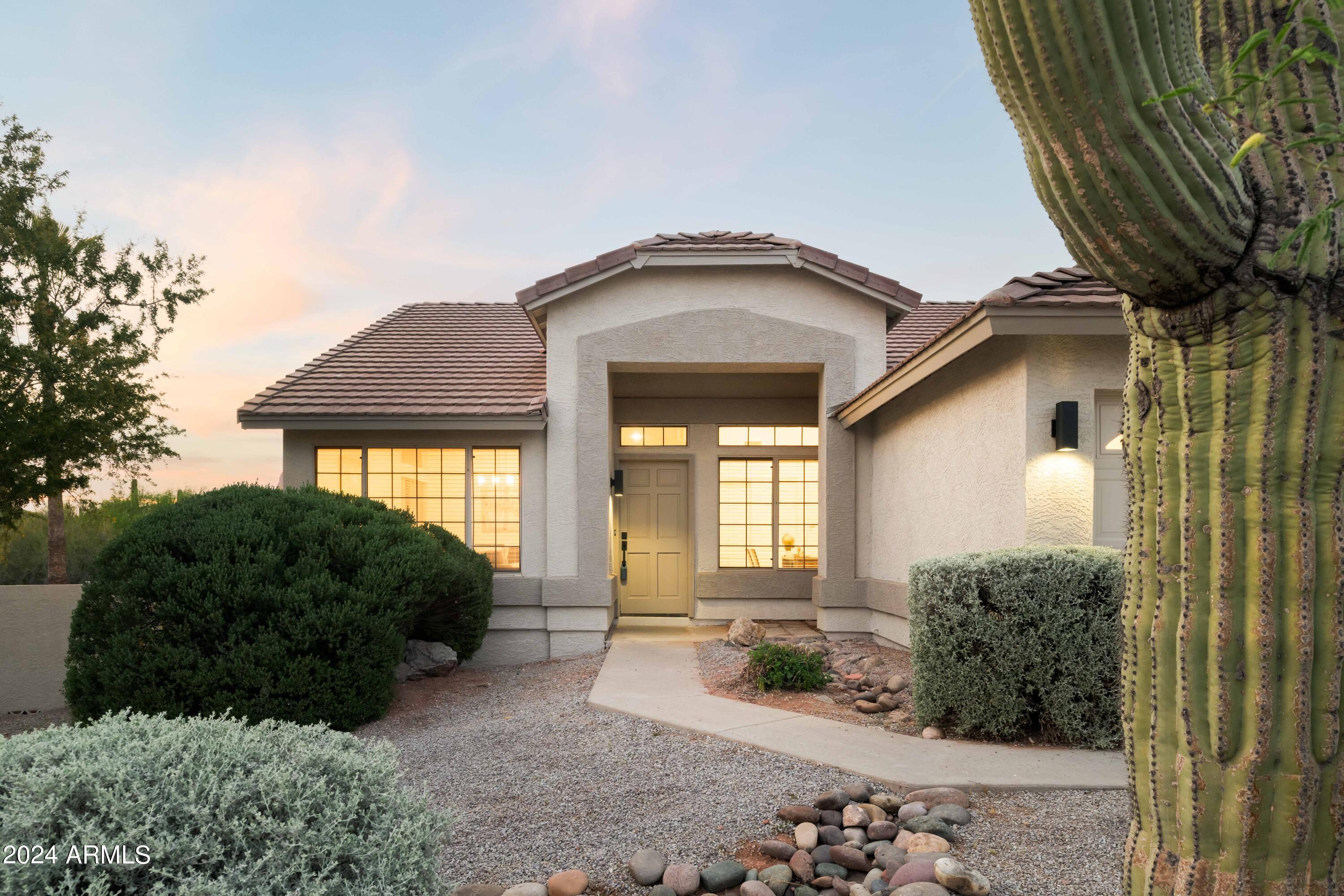 10142 E DAYBREAK Place