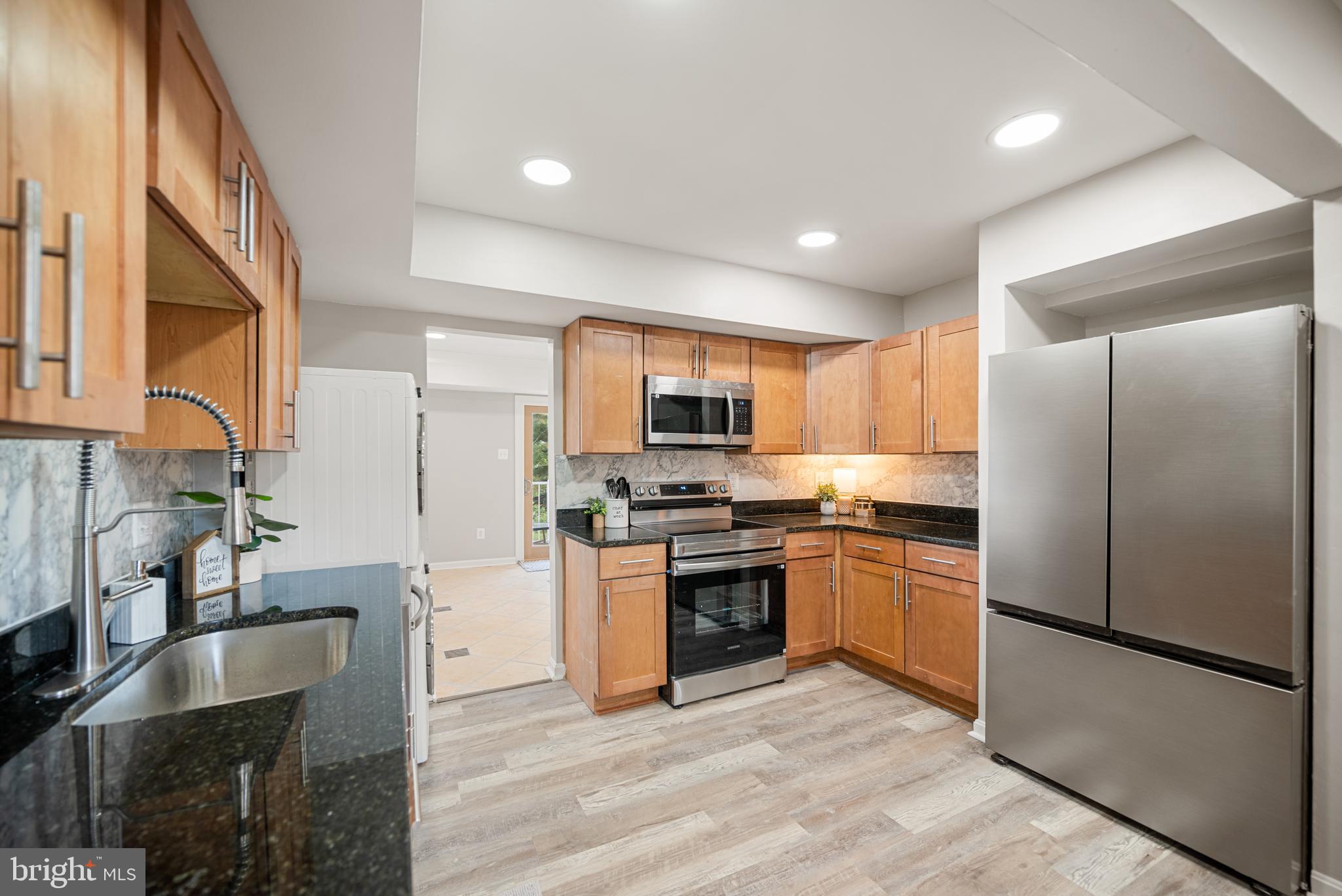 14487 RUSTLING LEAVES LANE