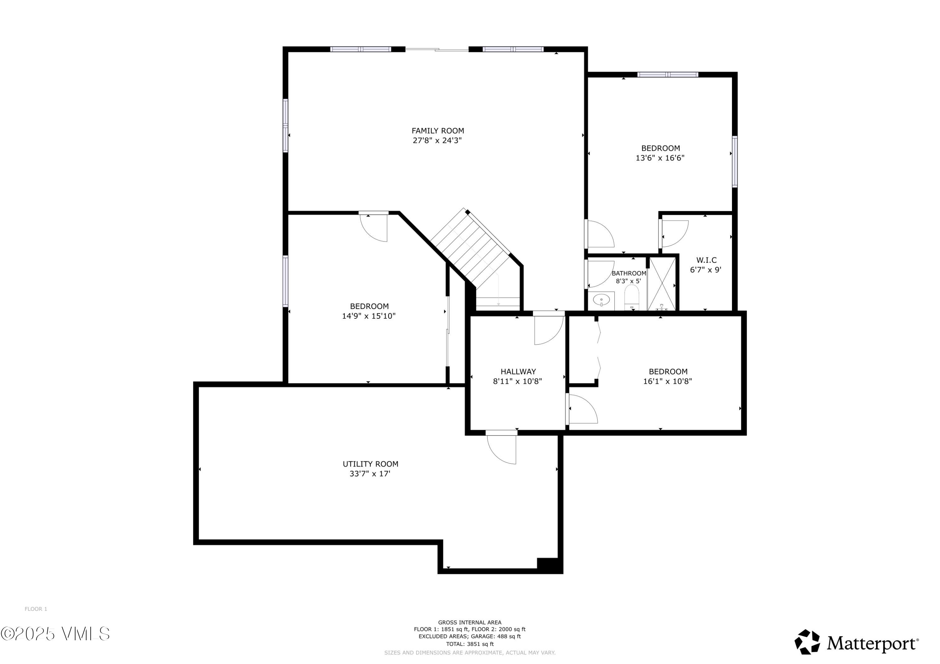 Floor plan showing a family room, three bedrooms, bathroom, walk-in closet, hallway, and utility room.