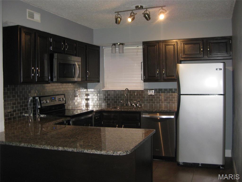 7035 Green Tee Court Unit: B
