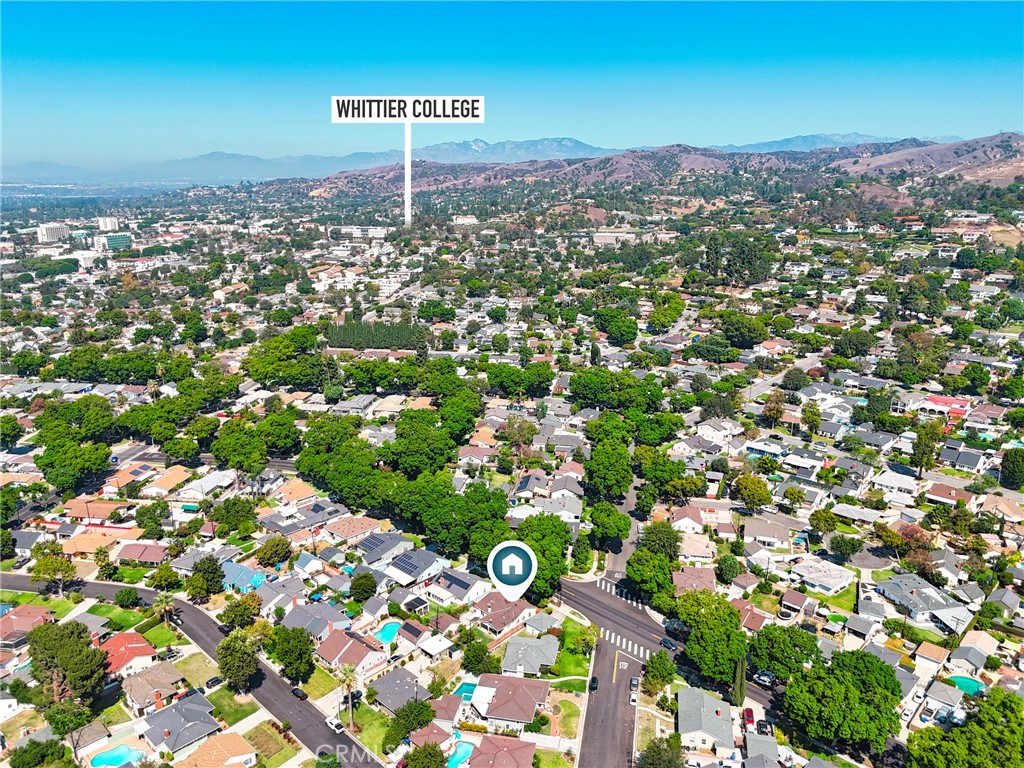 Aerial view of the home’s Whittier neighborhood, with Whittier College and distant hills in view.
