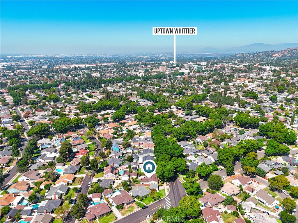 Aerial view of a Whittier neighborhood, with a marker identifying the property near Uptown Whittier.