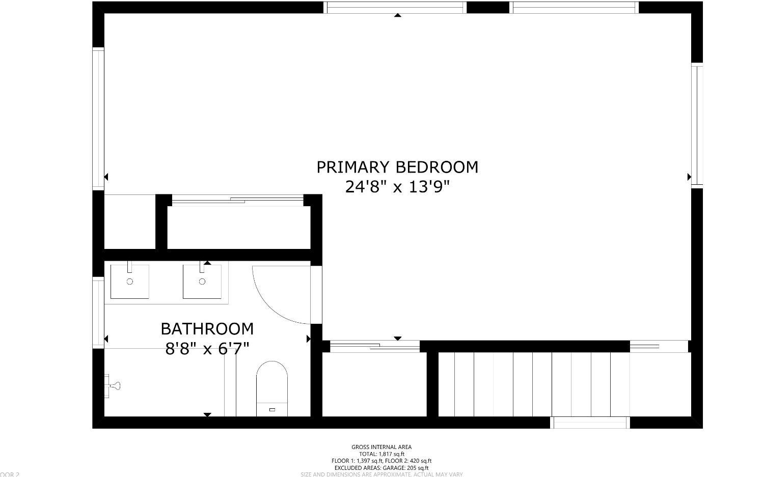 Floor plan showing a large primary bedroom, adjoining bathroom, and room dimensions.