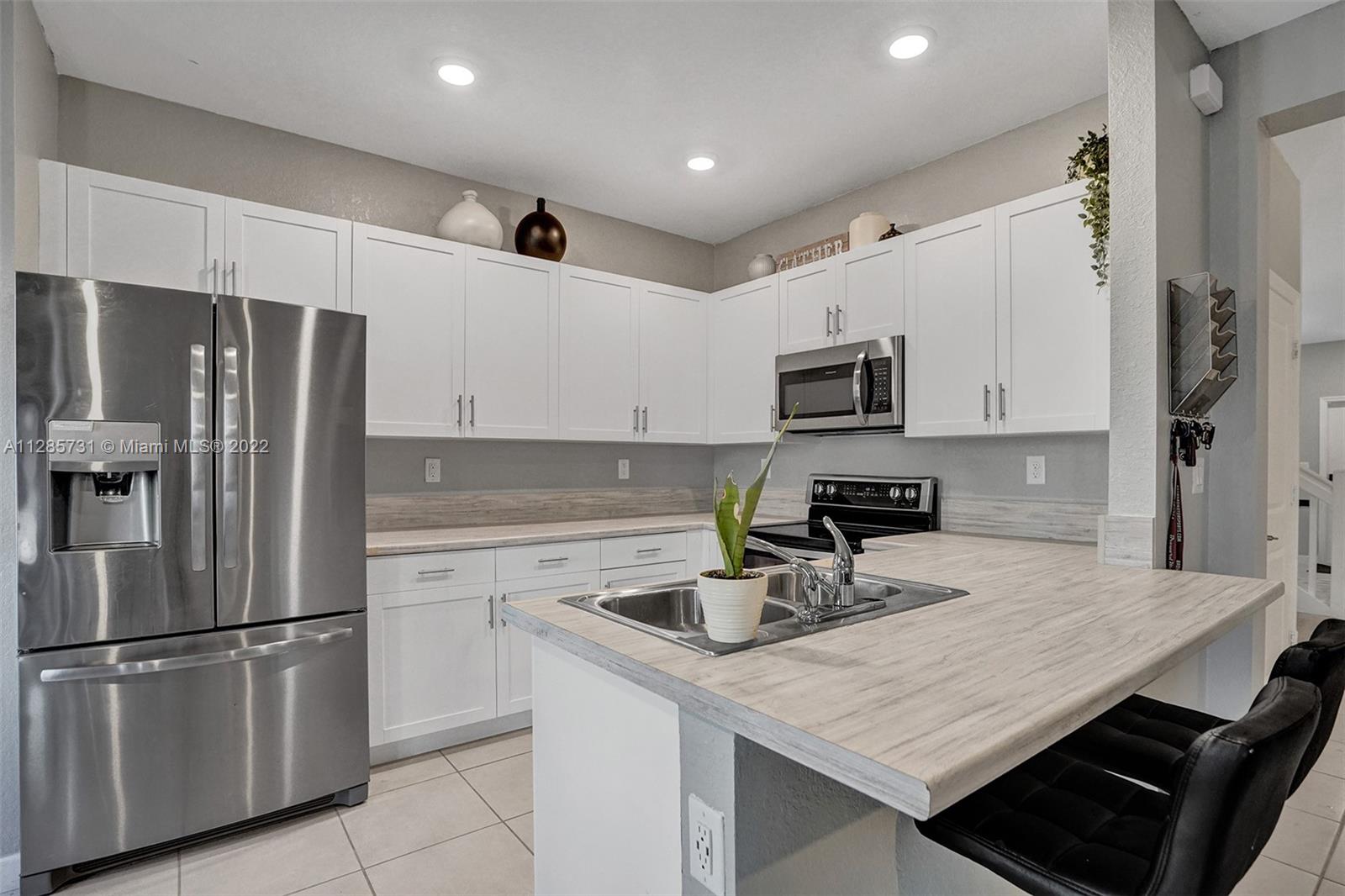 395 NE 211th Ter